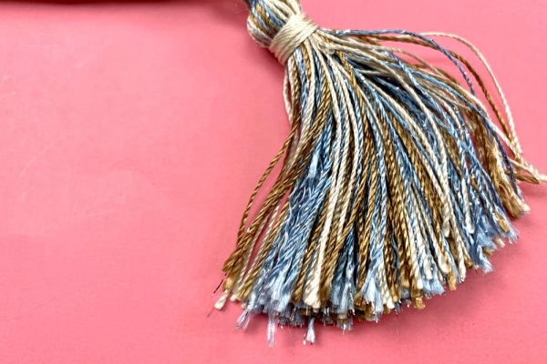 Give your tassels a unique look with soft and shiny Dazzle™ thread.